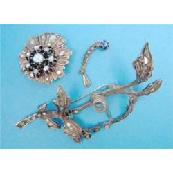 An Eastern yellow metal en tremblant floral spray brooch, set rough cut diamonds (a.f.)...