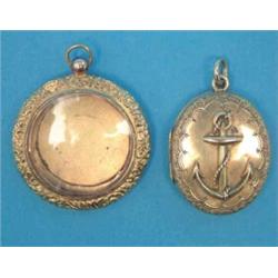 A Victorian gold oval pendant locket, the front applied with an anchor, the reverse foliate engra...