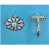 Image 1 : A diamond and sapphire dress ring, the oval plaque millegrain set with sworls of round cut diamon...