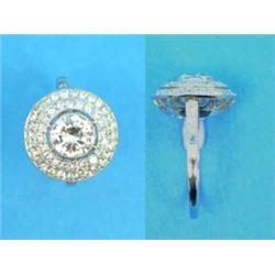 A platinum and diamond ring, millegrain set with a round brilliant cut diamond bordered by 2 rows...