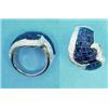 Image 1 : An 18ct white gold dress ring, the shaped wide band invisibly set with sapphires edged by round a...