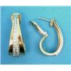 Image 1 : A pair of 18k gold hoop earrings, each set with a tapered line of round cut diamonds...