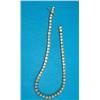 Image 1 : A 14k gold and diamond line bracelet, claw-set with 57 brilliant cut diamonds, (total diamond wei...