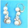 Image 1 : A pair of gold, diamond and pearl drop earrings, designed as 'S' shaped scrolls, each set 3 cultu...