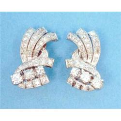 A pair of Art Deco design white gold all diamond set earclips, of stylised tassel design...
