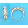 Image 1 : A gold claw-set 5-stone diamond half hoop ring...