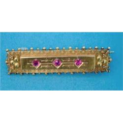 A Victorian 15ct gold rectangular bar brooch, with bead and wirework decoration gypsy set 3 synth...