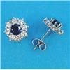 Image 1 : A pair of white gold, sapphire and diamond cluster earrings, each with a round cut sapphire borde...