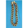 Image 1 : A gold curb link bracelet, 23.5grms...
