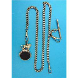 A 9ct gold curblink albert, 33.9grms, together with a gold mounted hardstone swivel fob with lion...