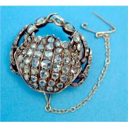 A Victorian gold brooch, designed as a crab pave set rose cut diamonds...