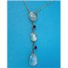Image 1 : A gold moonstone and sapphire pendant necklace, designed as a 3 moonstone and 2 sapphire set drop...