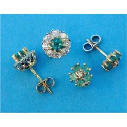 A pair of emerald and diamond circular cluster earstuds, together with a pair of emerald cluster...