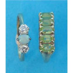 A gold 3-stone opal and diamond ring, together with a 9ct gold ring set 5 oval cut peridots...