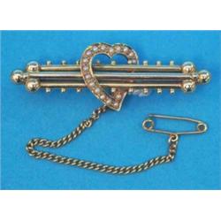 An Edwardian gold bar brooch, with seed pearl set open heart motif and beaded decoration (cased)...