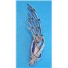 Image 1 : An 18ct white gold stylised tied ribbon floral spray brooch, millegrain set 8 rectangular cut eme...