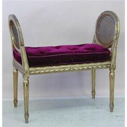 LOUIS XVI STYLE GILTWOOD BENCH, The rectangular cane seat flanked by oval cane sides, raised on...
