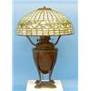 Image 1 : TIFFANY STUDIOS "ACORN" LEADED GLASS AND BRONZE TABLE LAMP, American. Circa 1910. The domed sha...