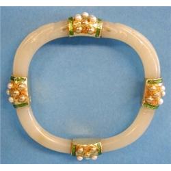FINE DAVID WEBB JADE, CULTURED PEARL AND ENAMEL BANGLE BRACELET, Signed Webb. Designed in sligh...