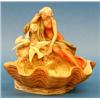 ROYAL DUX PORCELAIN GROUP, Bohemian. 20th Century. Of a young maiden sitting on a rock with two...
