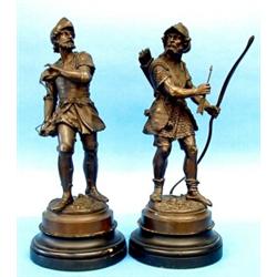 PAIR OF PATINATED BRONZE FIGURES OF MEDIEVAL WARRIORS, European. 19th Century. One holding a bo...