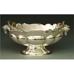 IMPRESSIVE STERLING SILVER CENTER BOWL, Italian. The oval vessel with lobed body and pedestal b...