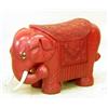 Image 1 : PAIR OF MOLDED CINNABAR AND COMPOSITION ELEPHANT SEATS, Each with floral design saddle and clot...