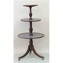 GEORGE III/IV INLAID MAHOGANY DUMBWAITER, English. Circa 1825. The baluster standard supporting...