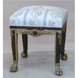 PAIR OF EMPIRE STYLE PAINTED AND GILT WOOD STOOLS, French. 19th Century. Each square upholstere...