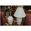 Image 1 : A pair of Urn style table lamps with floral motif
