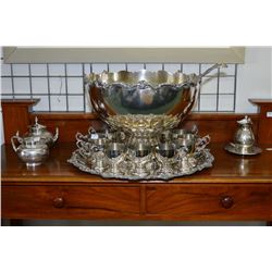 Large silver-plate punch bowl set with bowl, twelve punch cups, drip tray and punch ladle plus a sil