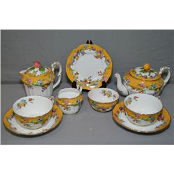 Vintage Crown Staffordshire tea set with small teapot, open sugar and cream jug, two cups and saucer