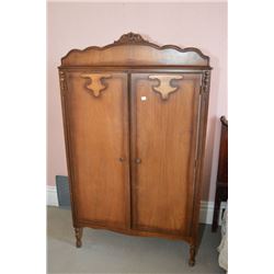 Oak two door wardrobe with three drawers, and hangers Rm103