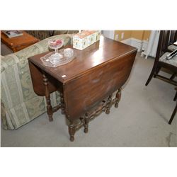 Mid 20th Century mahogany eight legged drop leaf table
