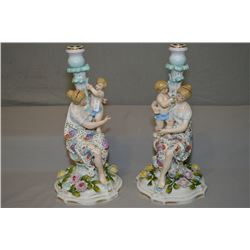 A pair of antique matched German Rococo porcelain figural candlesticks 14" in height
