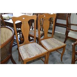 Two oak side chairs with upholstered seats