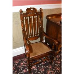 Antique open armed parlour chair with interesting half-column designed back and carved decoration