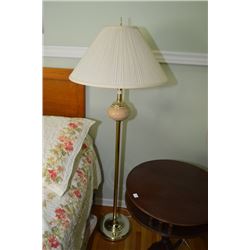 Modern brass coloured and glass floor lamp