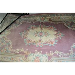 Wool area rug with floral medallion and border 71" x 107"