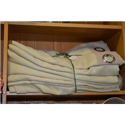 Nine large grometed curtain panels