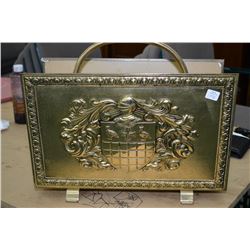 Brass bas relief magazine rack