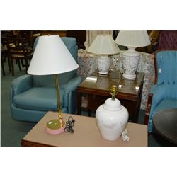 Two modern table lamps including white porcelain lamp and pink lamp with adjustable arm