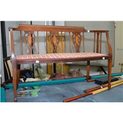 Delicate wooden bench with upholstered seat and satin wood inlay