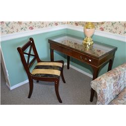 Fold-over extending table a mismatched modern side chair