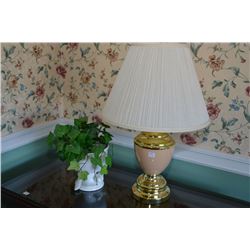 Bird motif planter and a brass coloured and glass table lamp