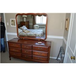 Five drawer highboy, nine drawer mirrored dresser and a queen sized headboard