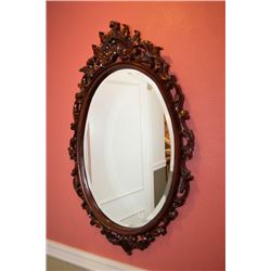 Carved mahogany framed Victorian style bevelled wall mirror overall dimensions 40"x 25"
