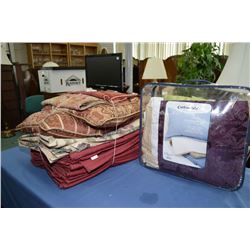 Selection of linens including curtain panels, bed skirts, table runners, throw pillows etc.