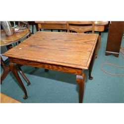 Vintage wooden library table on tall cabriole supports