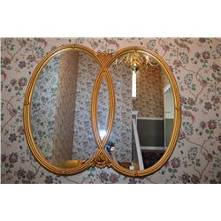 Gilt framed double oval wall mirror